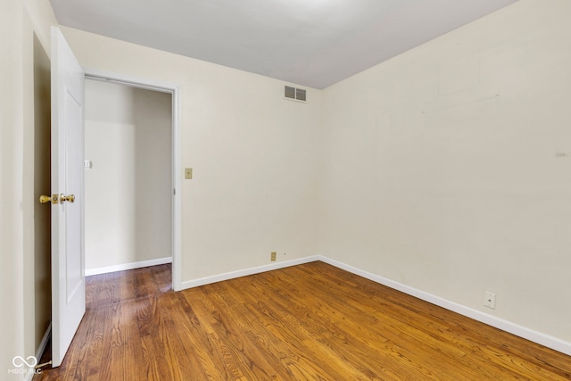 518 N Carr Rd, Plainfield, IN 46168 - spare room featuring wood finished floors and baseboards