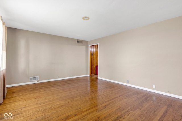 518 N Carr Rd, Plainfield, IN 46168 - spare room with wood finished floors and baseboards