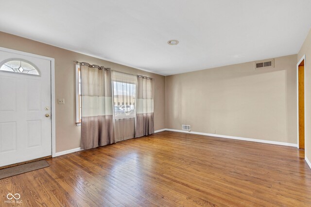 518 N Carr Rd, Plainfield, IN 46168 - foyer entrance featuring plenty of natural light, wood finished floors, and baseboards