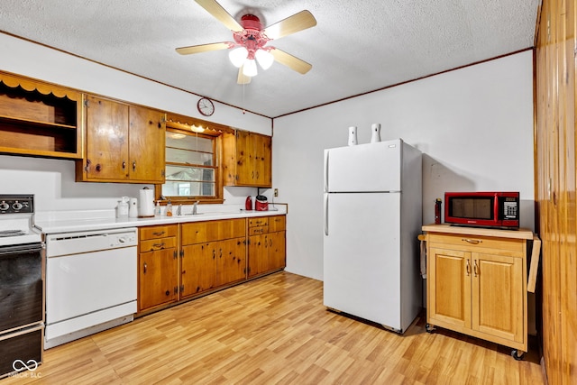 518 N Carr Rd, Plainfield, IN 46168 - kitchen with white appliances, a textured ceiling, light countertops, ceiling fan, and light wood finished floors