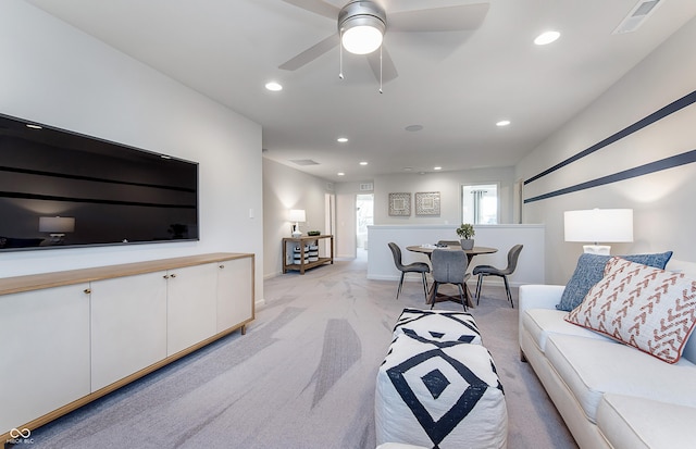 591 Dalton Way, Avon, IN 46123 - living room with light colored carpet, recessed lighting, a ceiling fan, and baseboards