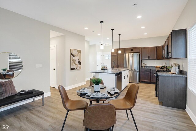 1429 Deloss St, Indianapolis, IN 46201 - dining space featuring light wood-type flooring, baseboards, and recessed lighting