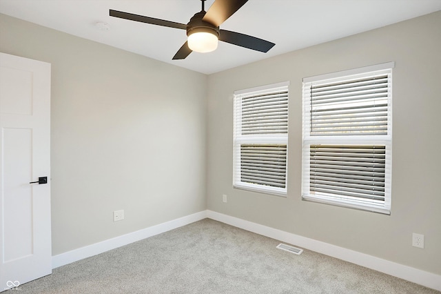 1429 Deloss St, Indianapolis, IN 46201 - carpeted spare room featuring a ceiling fan and baseboards