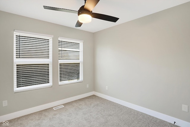 1429 Deloss St, Indianapolis, IN 46201 - carpeted empty room with ceiling fan and baseboards