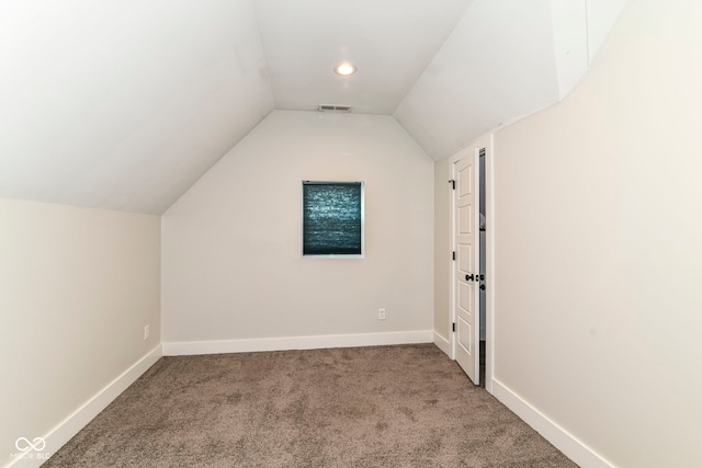1043 N Beville Ave, Indianapolis, IN 46201 - additional living space featuring carpet flooring, vaulted ceiling, baseboards, and recessed lighting