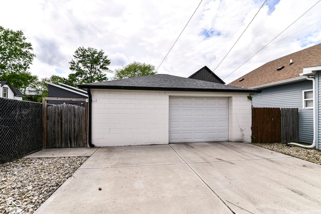 1043 N Beville Ave, Indianapolis, IN 46201 - detached garage featuring concrete driveway