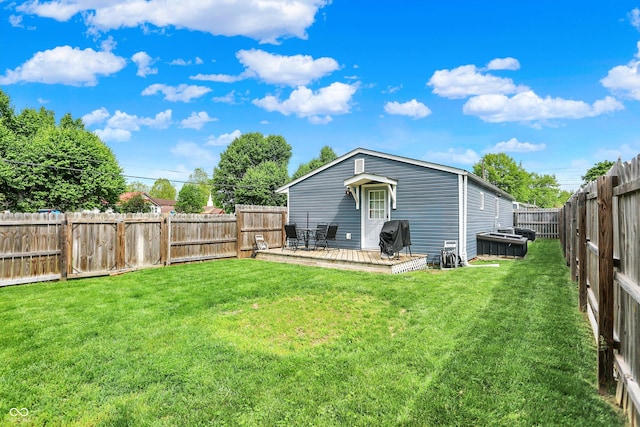 rear view of house featuring a deck