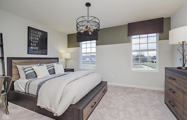 7239 Barrett Dr, Brownsburg, IN 46112 - carpeted bedroom featuring a chandelier and baseboards