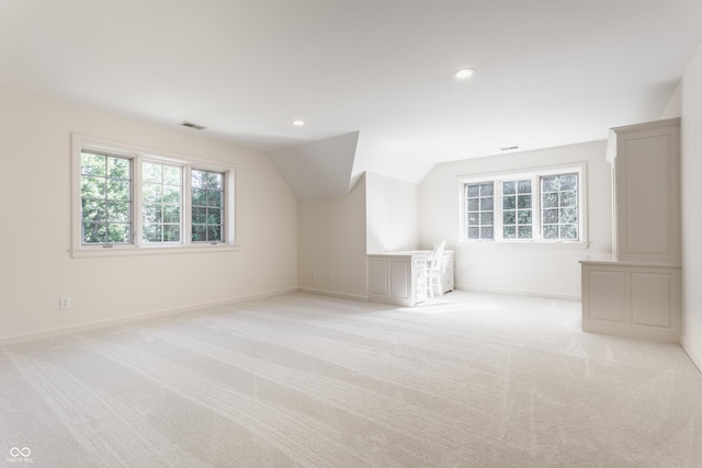 7406 N Washington Blvd, Indianapolis, IN 46240 - additional living space with light colored carpet, vaulted ceiling, recessed lighting, and baseboards