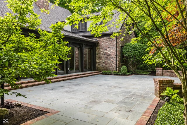 7406 N Washington Blvd, Indianapolis, IN 46240 - view of patio featuring french doors