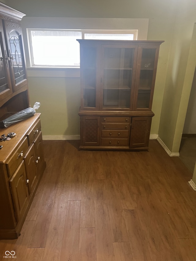 2146 Gent Ave, Indianapolis, IN 46202 - dining area with dark wood-style flooring and baseboards