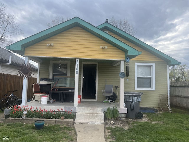 2146 Gent Ave, Indianapolis, IN 46202 - back of house with covered porch and fence