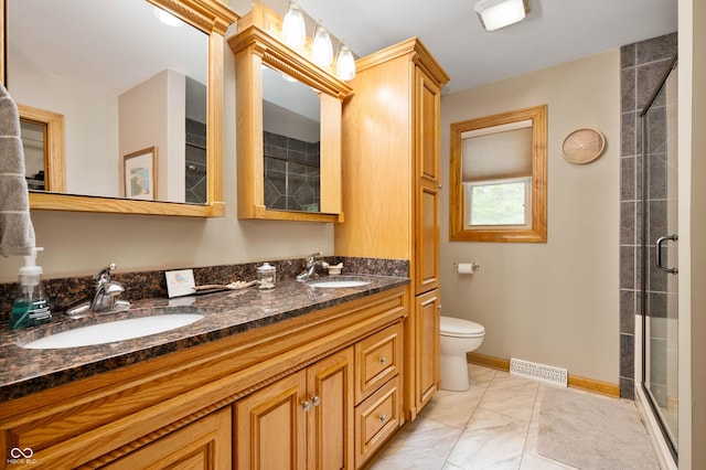 17216 W Hunnicut Rd, Cambridge City, IN 47327 - bathroom featuring a stall shower, double vanity, and marble finish flooring