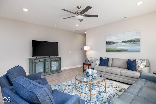 3622 S Setting Sun Ln, New Palestine, IN 46163 - living area featuring wood finished floors, a ceiling fan, baseboards, and recessed lighting