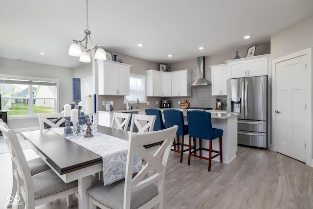 3622 S Setting Sun Ln, New Palestine, IN 46163 - dining space featuring light wood-type flooring and recessed lighting