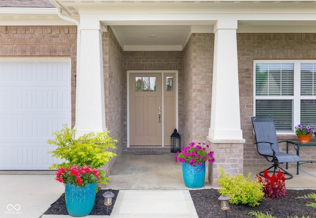 3622 S Setting Sun Ln, New Palestine, IN 46163 - entrance to property with covered porch, brick siding, and a garage