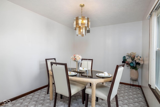 16226 Montrose Ln, Westfield, IN 46074 - carpeted dining area featuring a chandelier and baseboards