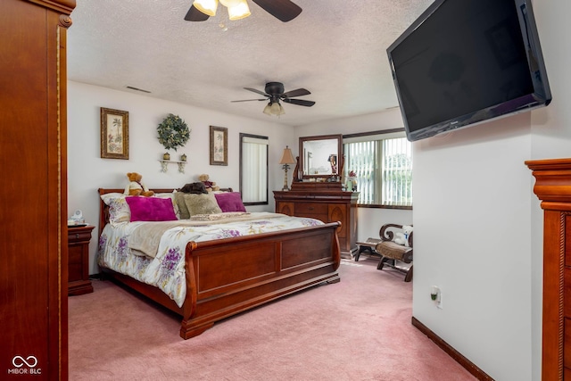16226 Montrose Ln, Westfield, IN 46074 - bedroom with light carpet, a textured ceiling, and a ceiling fan