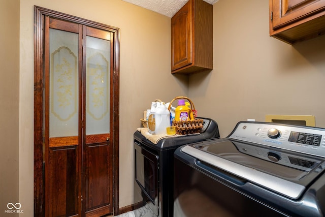16226 Montrose Ln, Westfield, IN 46074 - washroom featuring washing machine and clothes dryer, cabinet space, and a textured ceiling