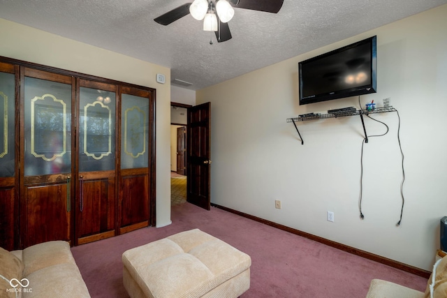 16226 Montrose Ln, Westfield, IN 46074 - carpeted living area with a ceiling fan, a textured ceiling, and baseboards