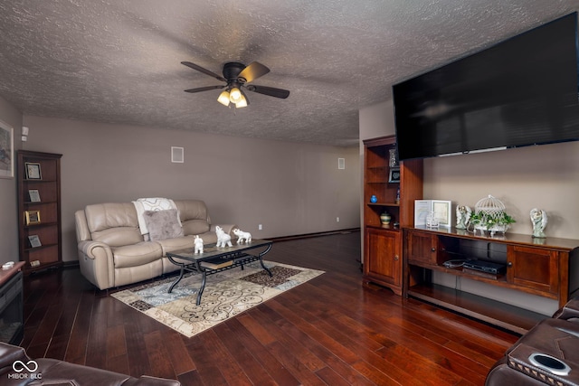 16226 Montrose Ln, Westfield, IN 46074 - living area featuring ceiling fan, a textured ceiling, wood-type flooring, and baseboards