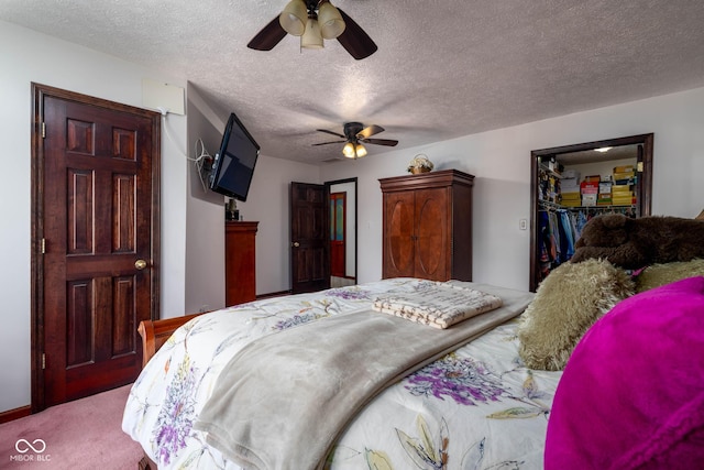 16226 Montrose Ln, Westfield, IN 46074 - bedroom with carpet, a textured ceiling, a ceiling fan, a spacious closet, and a closet