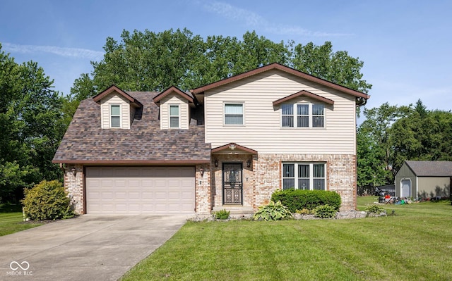 16226 Montrose Ln, Westfield, IN 46074 - view of front of home featuring brick siding, concrete driveway, a front lawn, and a garage