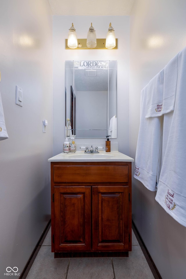 16226 Montrose Ln, Westfield, IN 46074 - bathroom with vanity, baseboards, and tile patterned floors