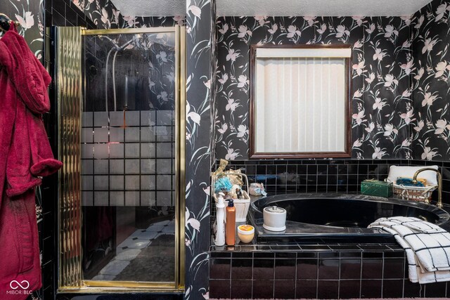 16226 Montrose Ln, Westfield, IN 46074 - full bath featuring wallpapered walls, a bath, a shower stall, and a textured ceiling