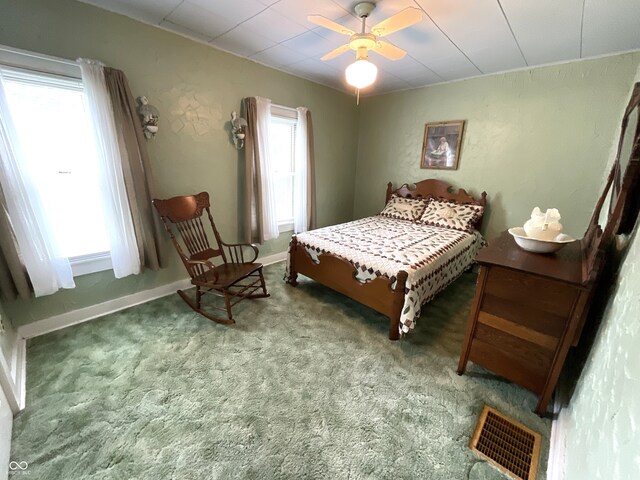 357 S Main St, Spencer, IN 47460 - carpeted bedroom with baseboards and a ceiling fan