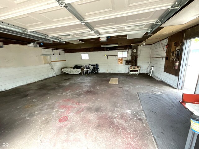 357 S Main St, Spencer, IN 47460 - garage featuring a garage door opener