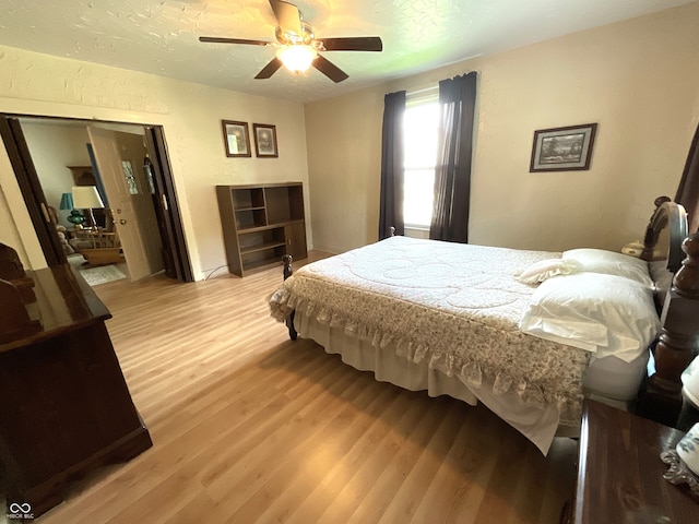357 S Main St, Spencer, IN 47460 - bedroom with light wood finished floors and ceiling fan