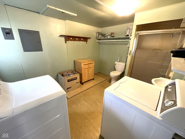 357 S Main St, Spencer, IN 47460 - clothes washing area with electric panel, light colored carpet, and washing machine and dryer