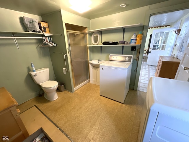357 S Main St, Spencer, IN 47460 - full bath featuring washer / clothes dryer, a shower stall, and tile patterned floors