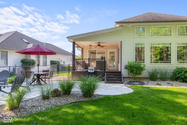3781 S Station Dr, Columbus, IN 47203 - rear view of house with a ceiling fan and a patio