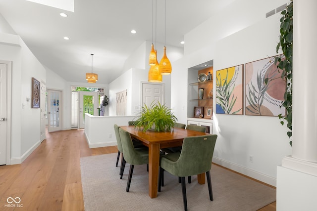 3781 S Station Dr, Columbus, IN 47203 - dining area with light wood finished floors, baseboards, built in shelves, and recessed lighting