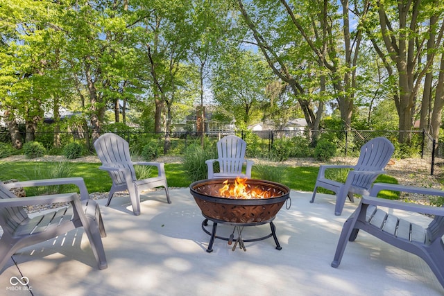 3781 S Station Dr, Columbus, IN 47203 - fenced backyard with a fire pit and a patio