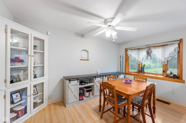 5330 W 56th St, Indianapolis, IN 46254 - dining room featuring light wood-style floors and ceiling fan
