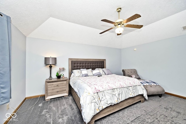 551 Windward Ln, Plainfield, IN 46168 - bedroom featuring baseboards, dark carpet, a textured ceiling, a ceiling fan, and vaulted ceiling