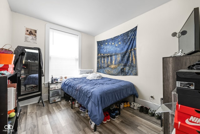 1446 N Illinois St, Indianapolis, IN 46202 - bedroom featuring wood finished floors