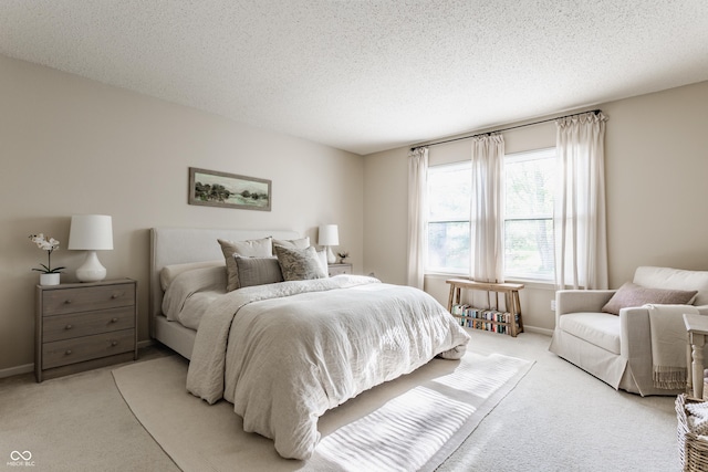 14291 Holly Berry Cir, Fishers, IN 46038 - bedroom featuring light carpet, a textured ceiling, and baseboards