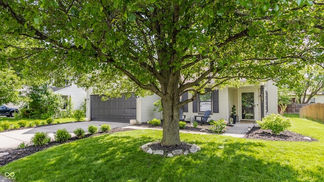 14291 Holly Berry Cir, Fishers, IN 46038 - obstructed view of property with asphalt driveway and an attached garage