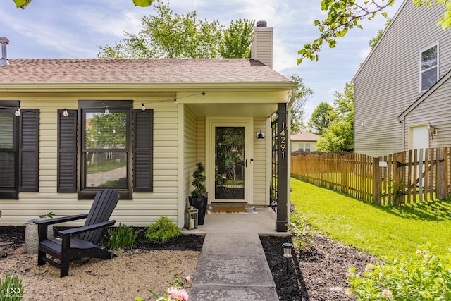 14291 Holly Berry Cir, Fishers, IN 46038 - view of exterior entry featuring a chimney