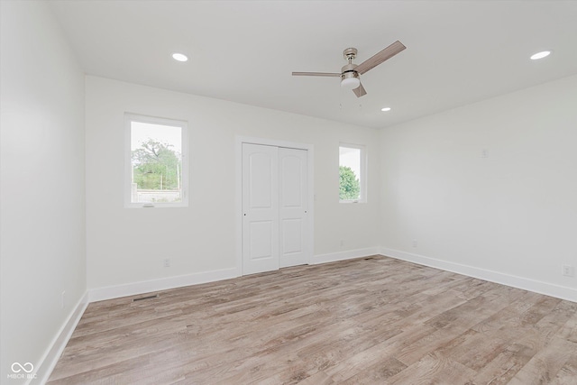 2302 S Pennsylvania St, Indianapolis, IN 46225 - unfurnished room featuring light wood-style flooring, a ceiling fan, baseboards, and recessed lighting