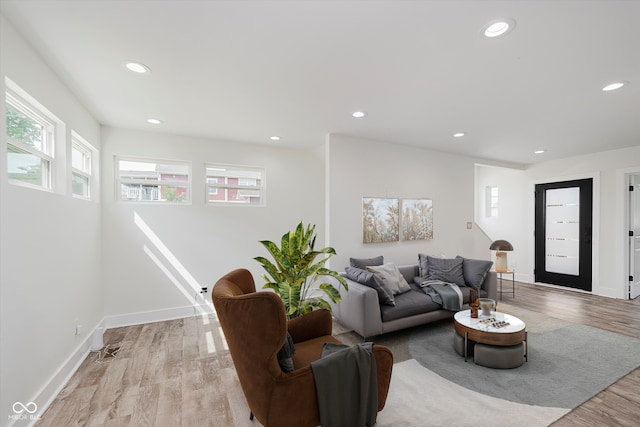 2302 S Pennsylvania St, Indianapolis, IN 46225 - living area with light wood-type flooring, recessed lighting, and baseboards