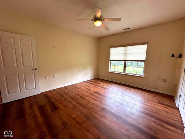 800 Eastfield Dr, Crawfordsville, IN 47933 - spare room featuring wood finished floors, a ceiling fan, and baseboards