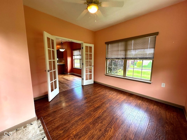 800 Eastfield Dr, Crawfordsville, IN 47933 - empty room with french doors, wood finished floors, a ceiling fan, and baseboards