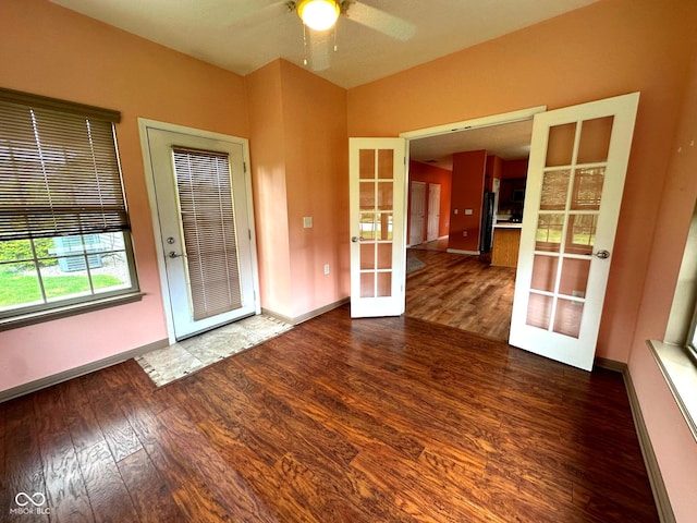 800 Eastfield Dr, Crawfordsville, IN 47933 - spare room featuring french doors, wood finished floors, baseboards, and ceiling fan