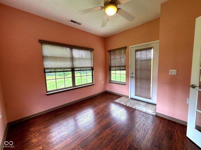 800 Eastfield Dr, Crawfordsville, IN 47933 - spare room with wood finished floors, a ceiling fan, and baseboards