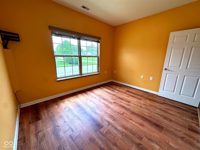 800 Eastfield Dr, Crawfordsville, IN 47933 - unfurnished bedroom with wood finished floors and baseboards